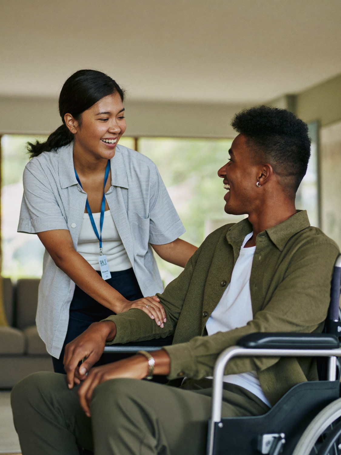 A support worker and the person they support, at home